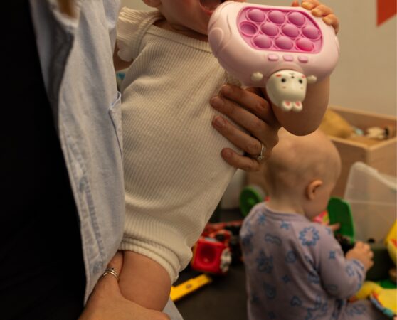 Babies playing in The Studio creche